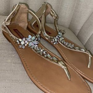 Gold sandals with rhinestone details
